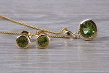 Load image into Gallery viewer, Round cut Peridot Earrings and Matching Necklace set in Yellow Gold