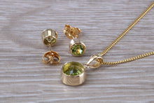 Load image into Gallery viewer, Round cut Peridot Earrings and Matching Necklace set in Yellow Gold