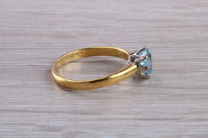 1.50 carat Aquamarine Solitaire set in Yellow Gold and Platinum