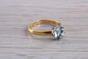 1.50 carat Aquamarine Solitaire set in Yellow Gold and Platinum