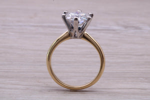 One and Half carat Moissanite Diamond set in this Beautiful 18ct Yellow Gold and Platinum Solitaire