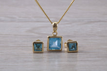 Load image into Gallery viewer, Square cut Blue Topaz Matching Earrings and Matching Necklace set in Yellow Gold