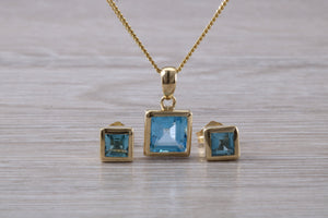 Square cut Blue Topaz Matching Earrings and Matching Necklace set in Yellow Gold