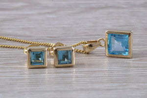 Square cut Blue Topaz Matching Earrings and Matching Necklace set in Yellow Gold