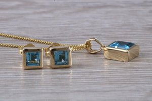 Square cut Blue Topaz Matching Earrings and Matching Necklace set in Yellow Gold