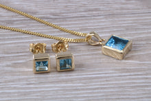 Load image into Gallery viewer, Square cut Blue Topaz Matching Earrings and Matching Necklace set in Yellow Gold