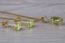 Load image into Gallery viewer, Oval cut Peridot Earrings and Matching Necklace set in Yellow Gold