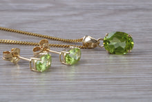 Load image into Gallery viewer, Oval cut Peridot Earrings and Matching Necklace set in Yellow Gold