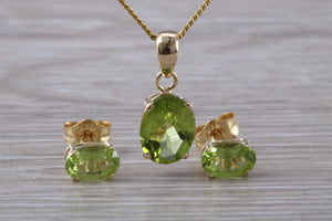 Oval cut Peridot Earrings and Matching Necklace set in Yellow Gold