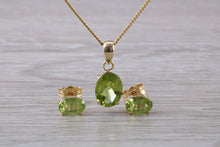 Load image into Gallery viewer, Oval cut Peridot Earrings and Matching Necklace set in Yellow Gold