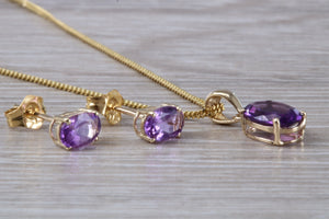 Oval cut Amethyst Earrings and Matching Necklace set in Yellow Gold