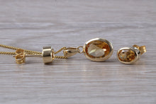 Load image into Gallery viewer, Oval cut Citrine Earrings and Matching Necklace set in Yellow Gold