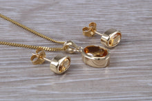 Load image into Gallery viewer, Oval cut Citrine Earrings and Matching Necklace set in Yellow Gold