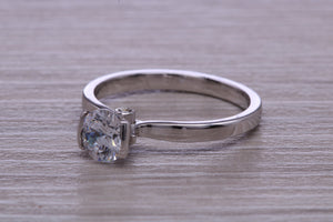 One carat Moissanite Diamond set in Four Claw Platinum Solitaire