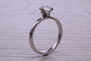 One carat Moissanite Diamond set in Four Claw Platinum Solitaire