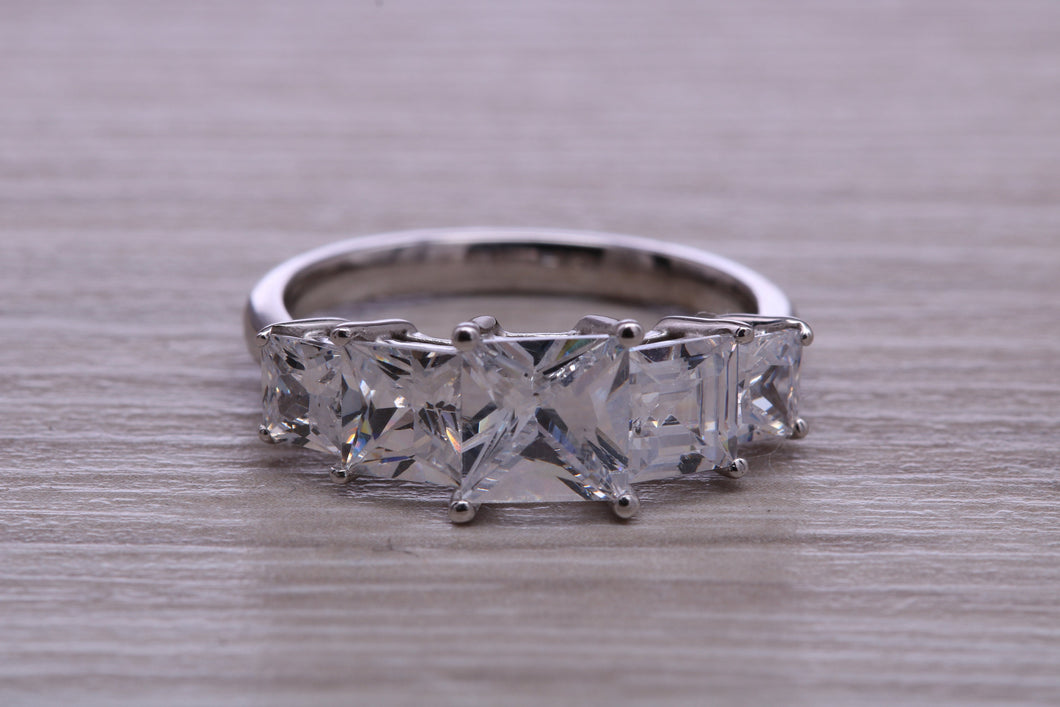 Very Dressy Four carat traditional Princess cut Moissanite Diamond Eternity Ring