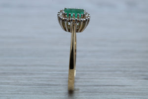 Emerald and Diamond Halo set Ring