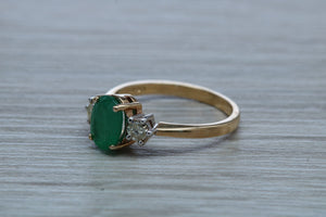 1.50ct Emerald and Diamond set Trilogy Ring