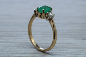 1.50ct Emerald and Diamond set Trilogy Ring