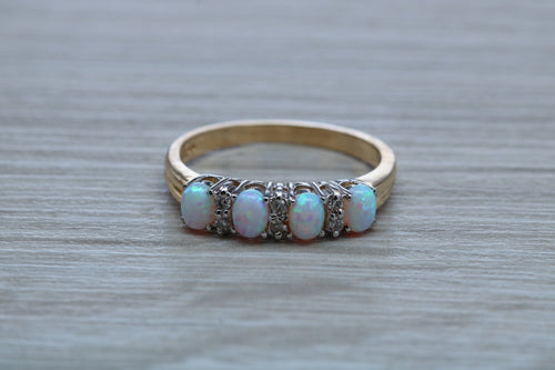 Fiery Opal and Diamonds set Yellow Gold Ring