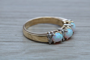 Fiery Opal and Diamonds set Yellow Gold Ring