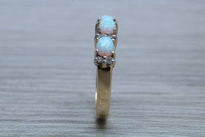 Fiery Opal and Diamonds set Yellow Gold Ring