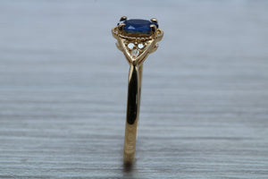 Oval cut Blue Sapphire and Diamond Ring