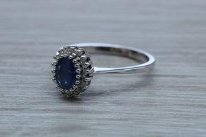 Halo set Blue Sapphire and Diamond Ring