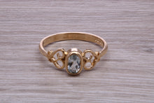 Load image into Gallery viewer, Swiss Blue Topaz set Yellow Gold Ring