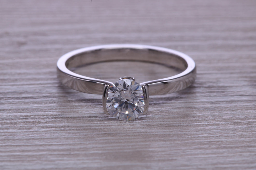 One carat Moissanite Diamond set in Four Claw Platinum Solitaire