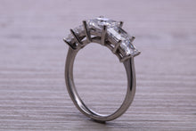 Load image into Gallery viewer, Very Dressy Four carat traditional Princess cut Moissanite Diamond Eternity Ring