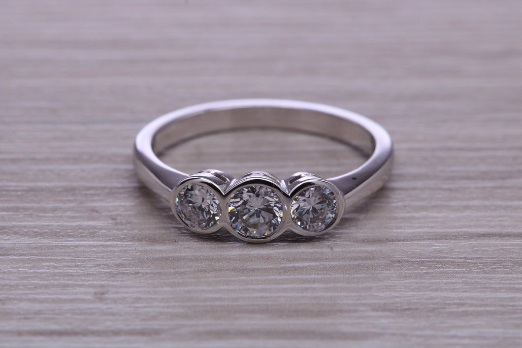 One carat Moissanite Diamond Trilogy set Platinum Ring