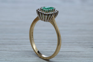 Emerald and Diamond Halo set Ring