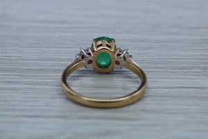 1.50ct Emerald and Diamond set Trilogy Ring