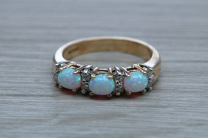 Fiery Opal and Diamonds set Yellow Gold Ring