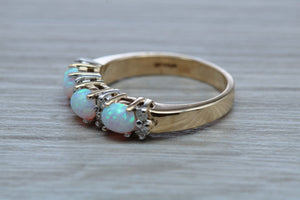 Fiery Opal and Diamonds set Yellow Gold Ring