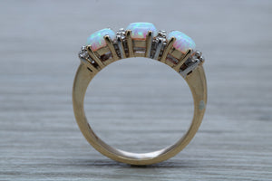 Fiery Opal and Diamonds set Yellow Gold Ring