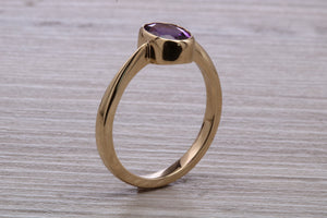 Oval cut Natural Amethyst set Yellow Gold Ring