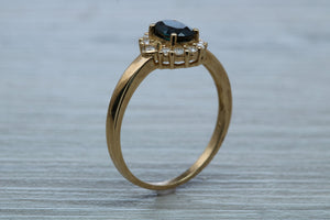 Blue Sapphire and Diamond Ring