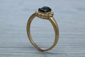 Blue Sapphire and Diamond Ring