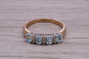 Sky Blue Topaz and Diamond set Yellow Gold Ring