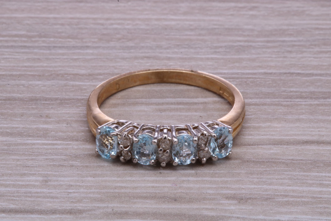 Sky Blue Topaz and Diamond set Yellow Gold Ring