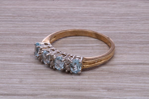 Sky Blue Topaz and Diamond set Yellow Gold Ring