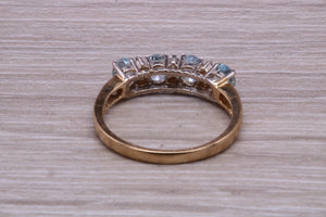 Sky Blue Topaz and Diamond set Yellow Gold Ring