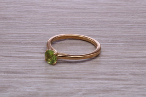 Round cut Quarter carat Peridot set Solitaire Ring