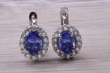 Load image into Gallery viewer, Two carat Tanzanite and Diamond set Earrings