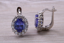 Load image into Gallery viewer, Two carat Tanzanite and Diamond set Earrings