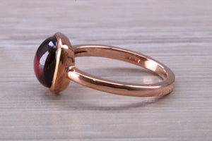 Cabochon cut Garnet set Rose Gold Solitaire