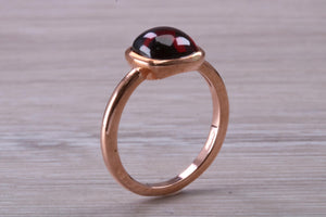 Cabochon cut Garnet set Rose Gold Solitaire