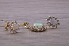 Load image into Gallery viewer, Oval cut Opal Earrings with Matching Necklace set in Yellow Gold